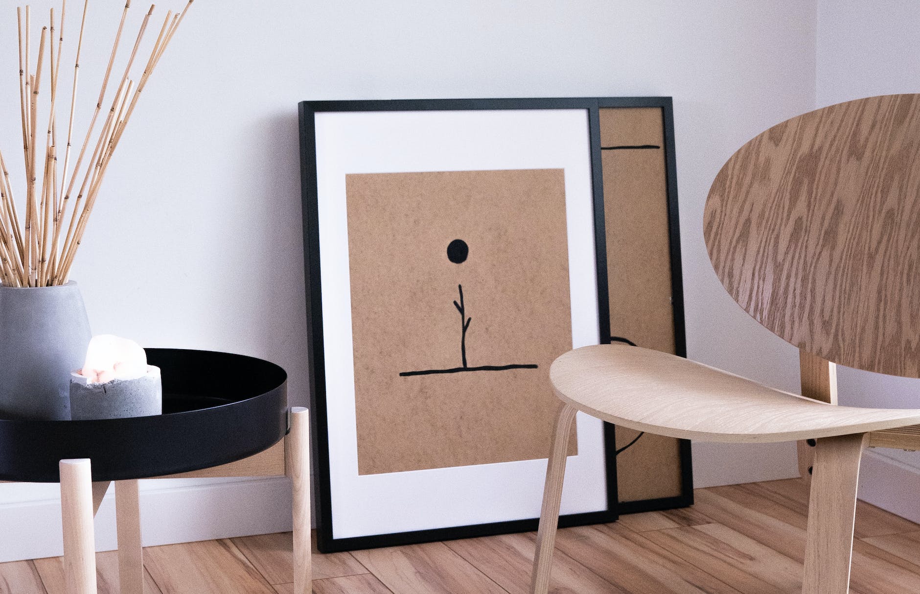 frames on brown wooden floor